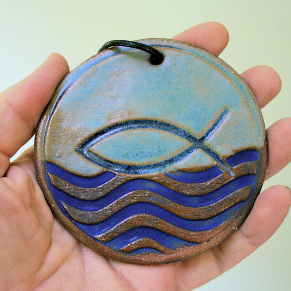 Fish Symbol Ornament with Blue Waves