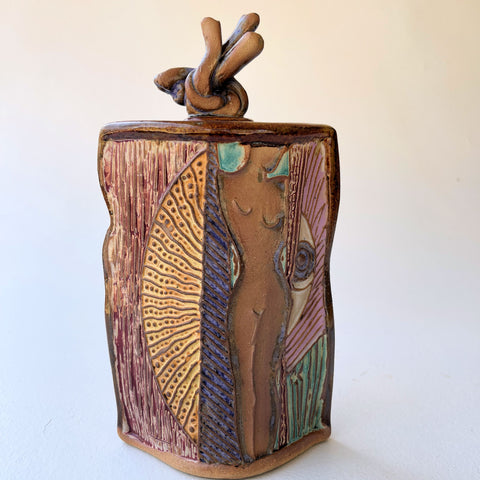 Nude vessel with lid