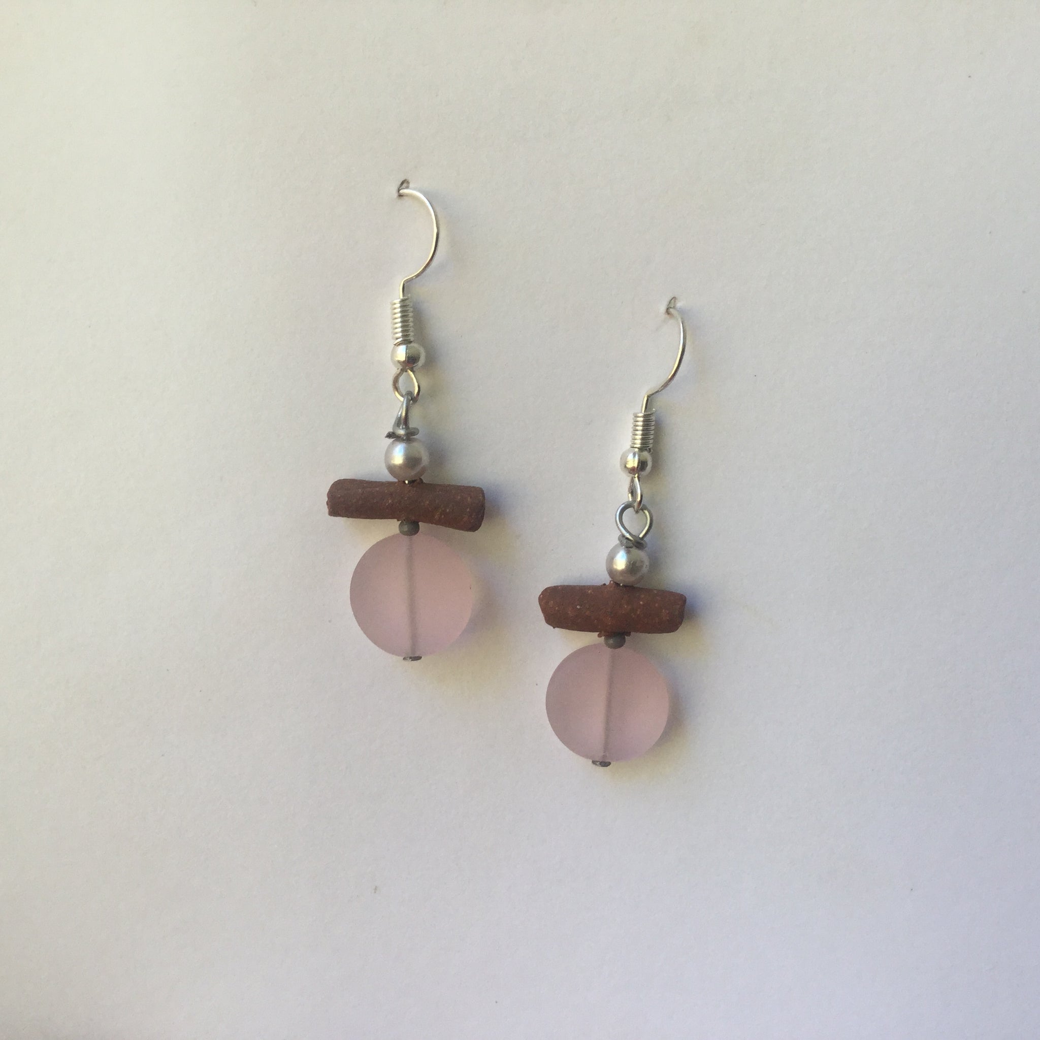 Pink Seaglass Earrings with hand-made stoneware beads. Surgical steel ear-wire, frosted glass and shell beads