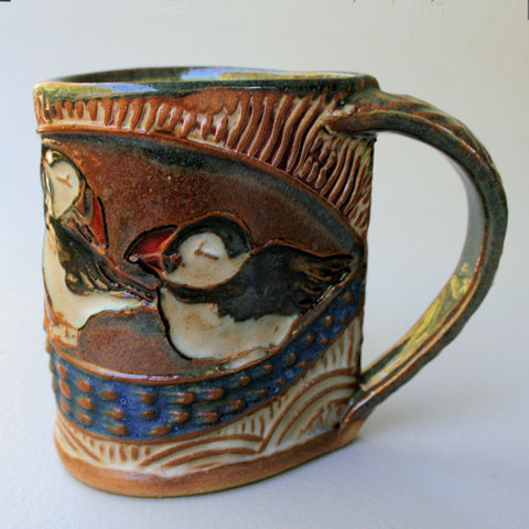 https://bumblebeepottery.com/cdn/shop/products/puffin_Pottery_Mug_Coffee_Cup_Handmade_Tableware_Microwave_and_Dishwasher_Safe_1_large.jpg?v=1499882050